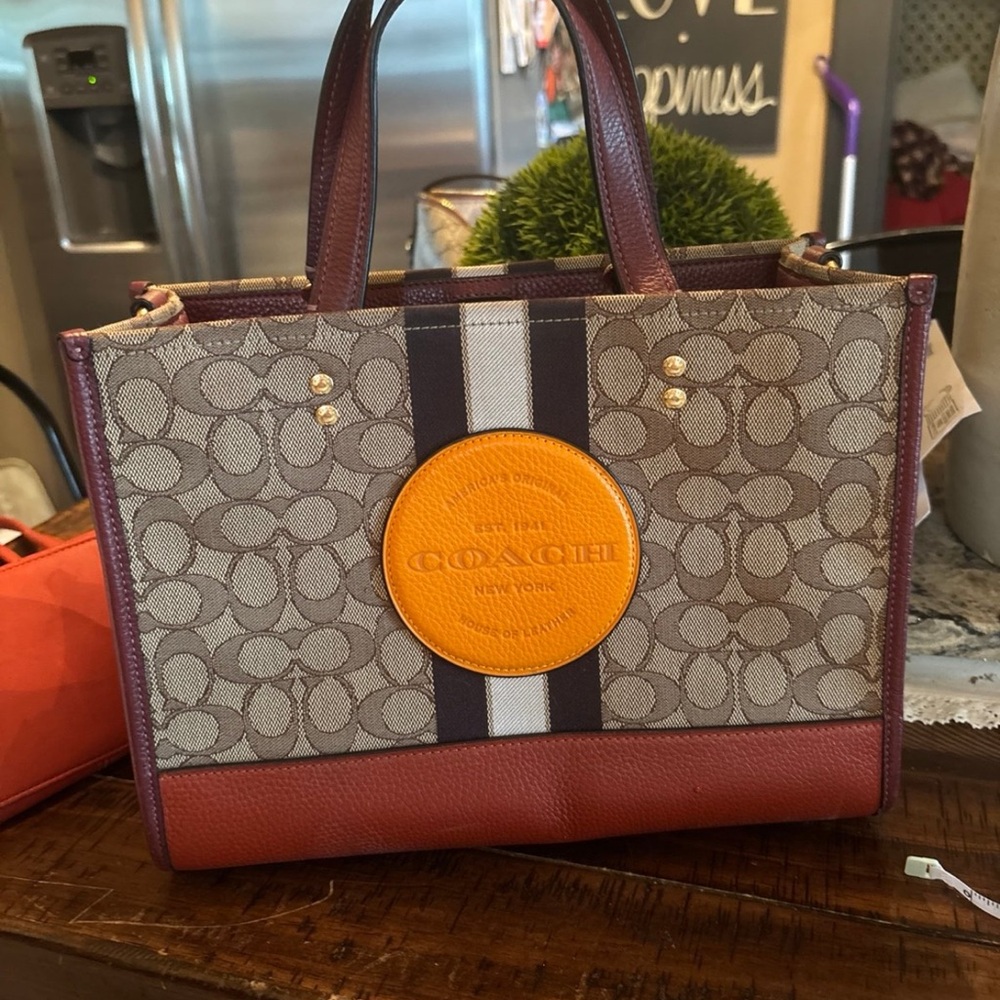Coach Signature Canvas Satchel with Orange Logo Patch and Burgundy Trim